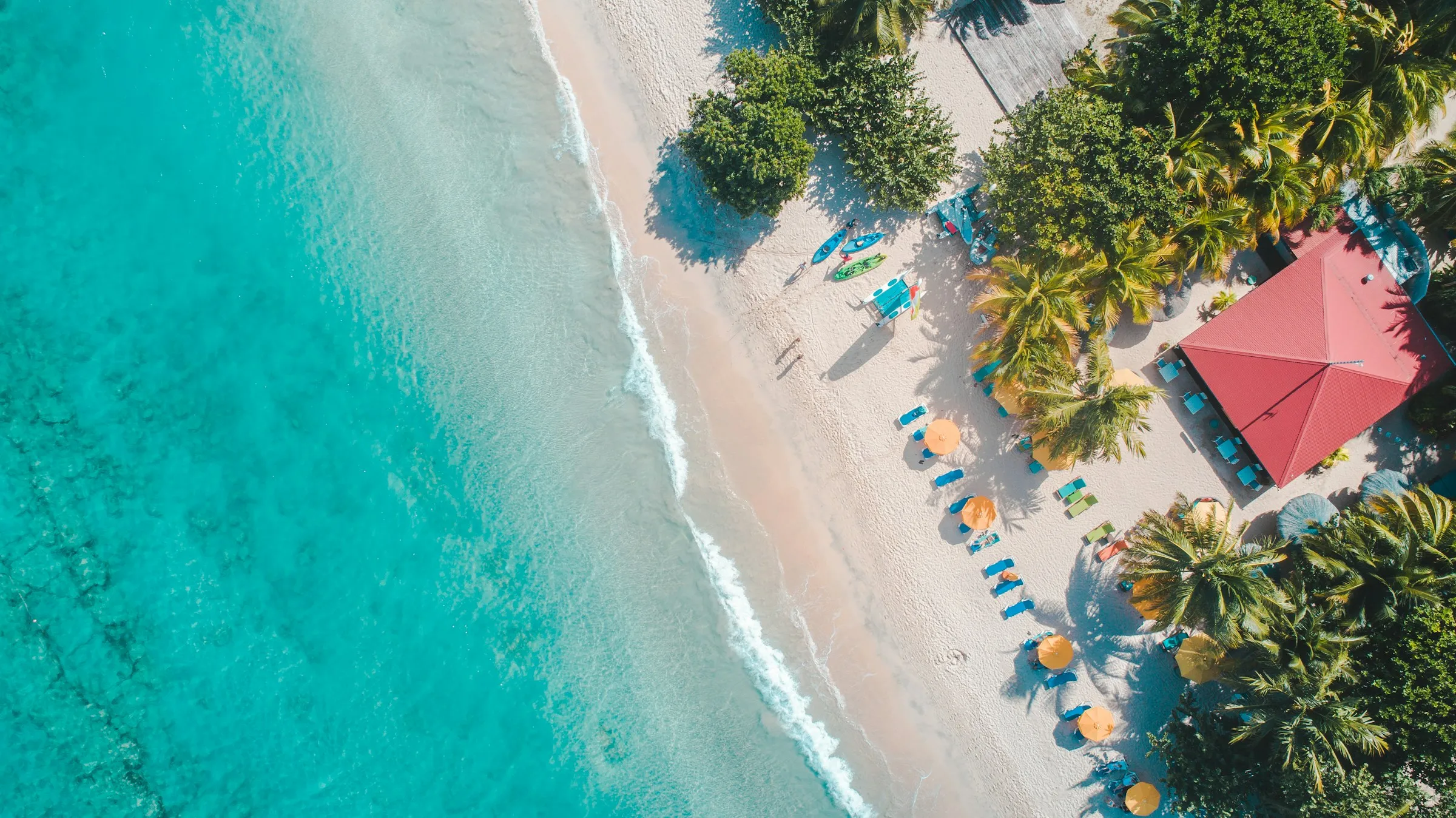 Aerial view of a Caribbean beach club and shoreline