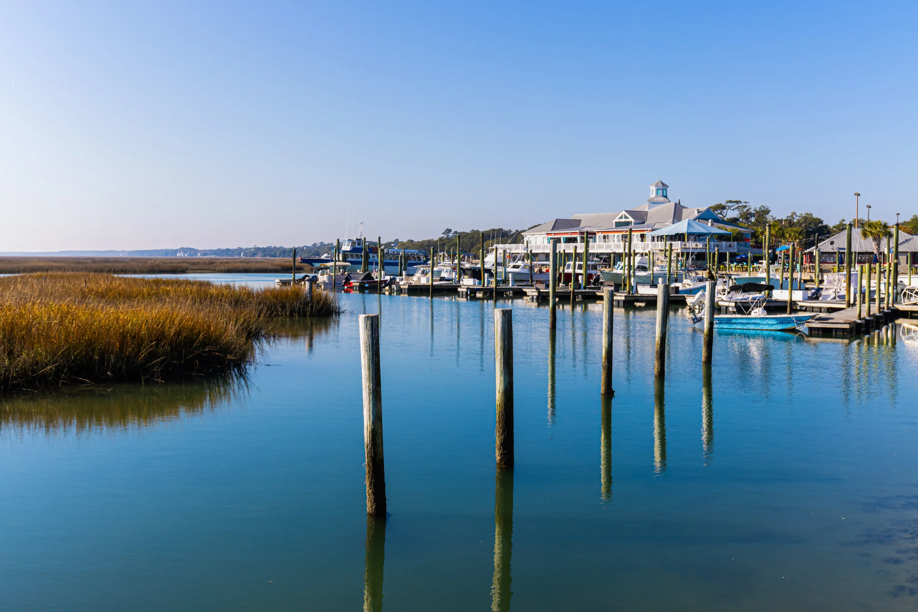 Fishing boats at the marina docks along the Murrells Inlet marsh near Myrtle Beach