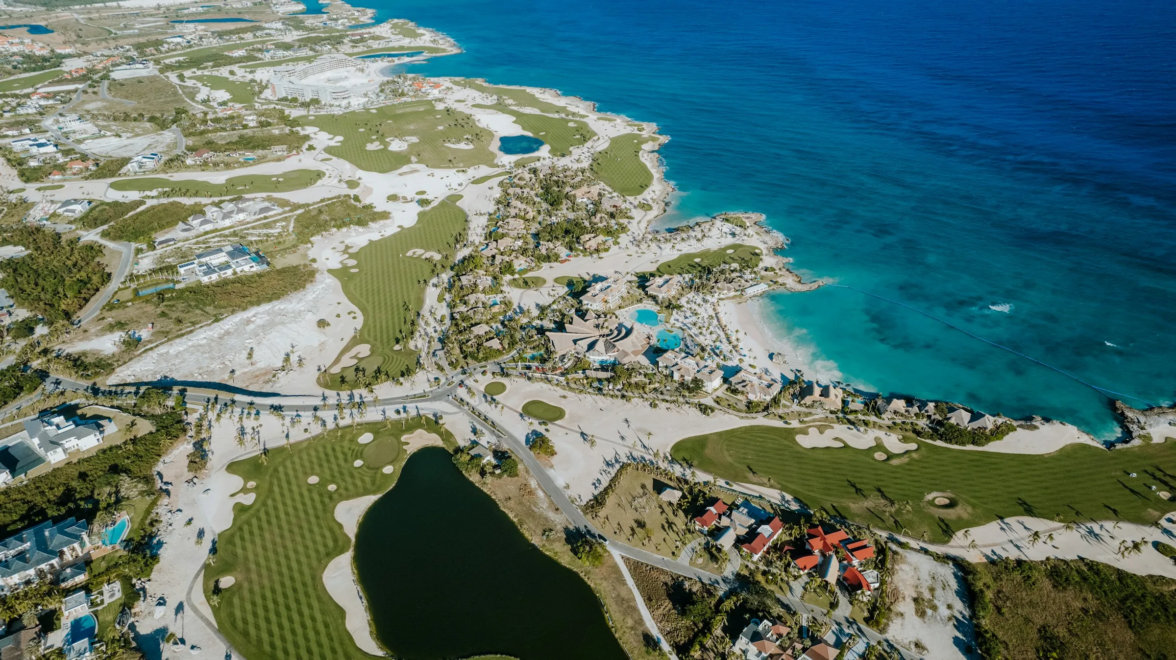 Aerial view of an oceanside golf course in Punta Cana