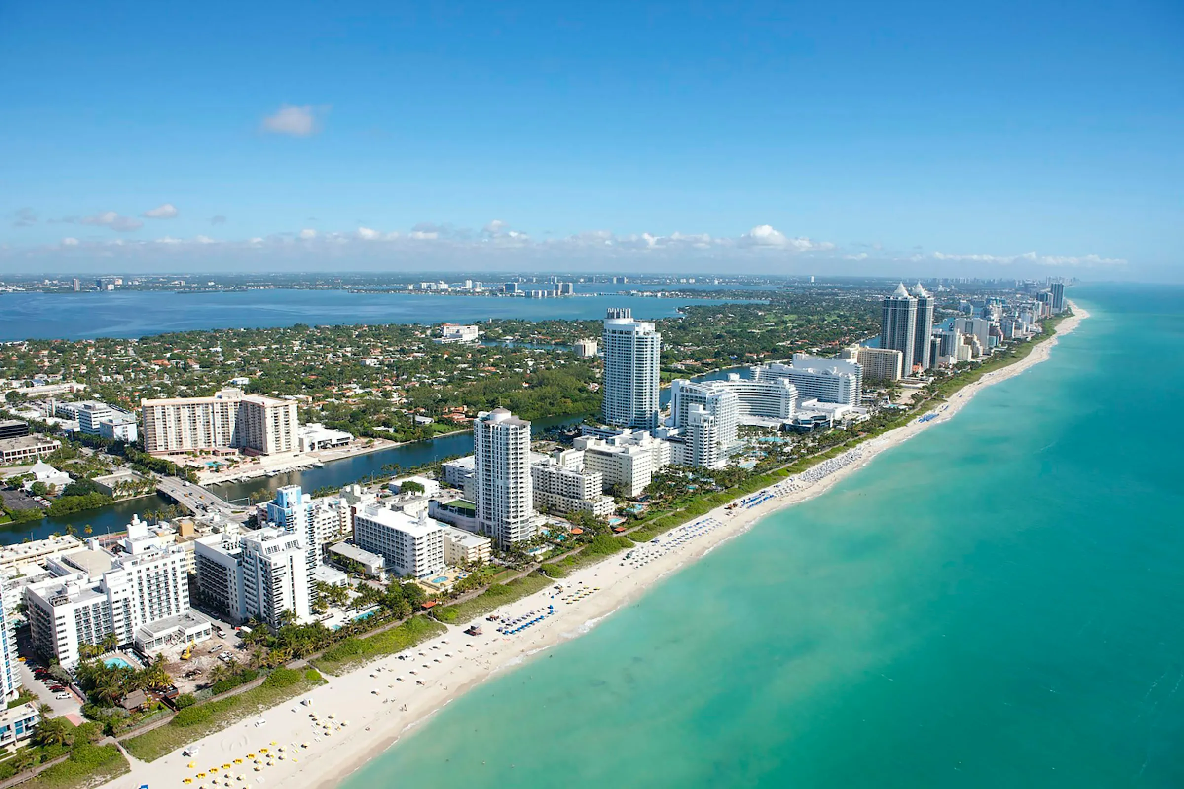 Aerial view of Miami Beach hotels and turquoise water