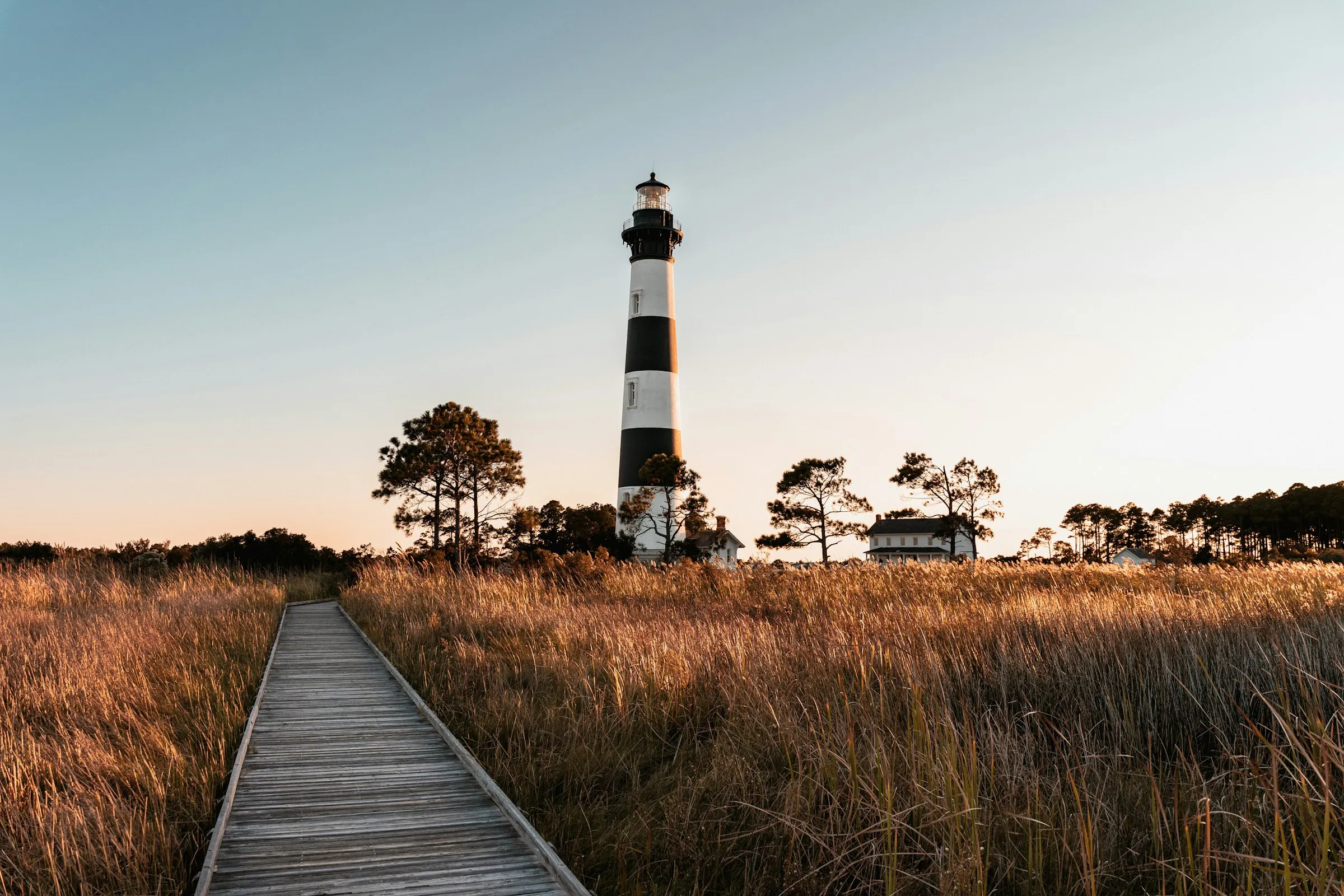 Bodie Island Lighthouse and boardwalk at golden hour, Outer Banks